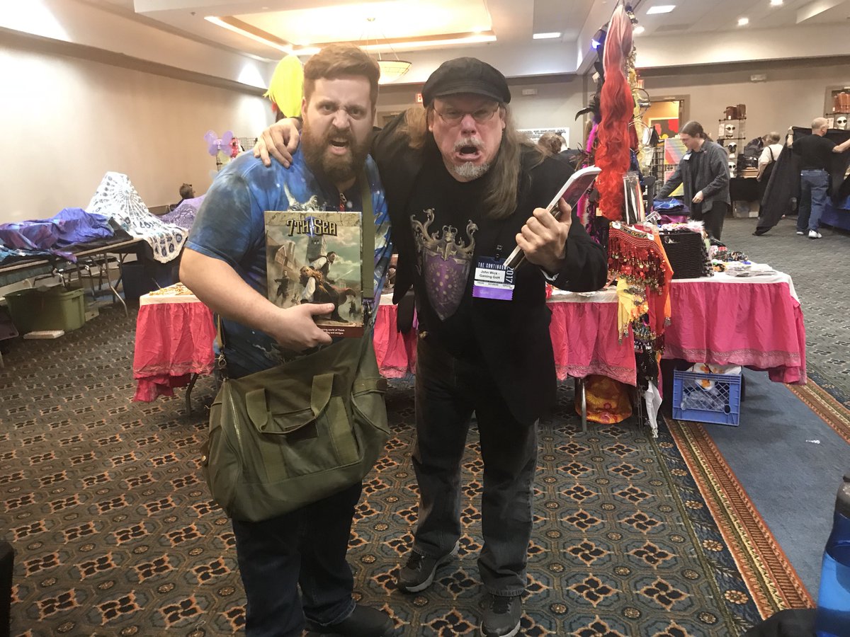 thunderhead_ent's tweet photo. Met John Wick, creator of 7th Sea, at #Continuum2017 ! We did an autograph swap on our games. “Everything is better with angry face.” -JW https://t.co/5IfVuYhsfo