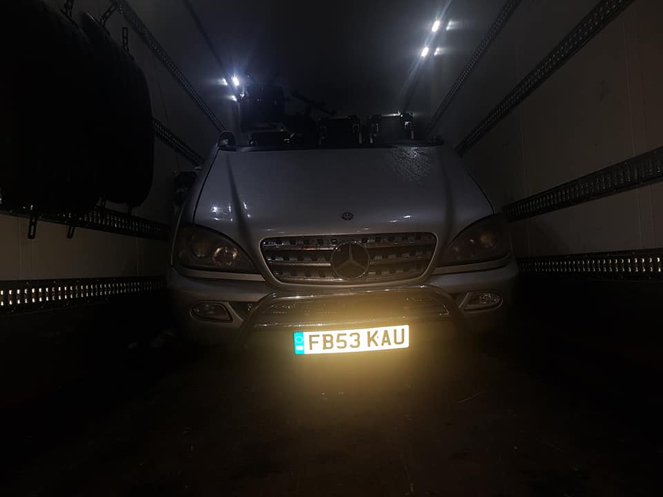 It`s surprising what we load in our trucks ! 1 half of a Mercedes as part of the set for one of the many musical artists we are on tour with