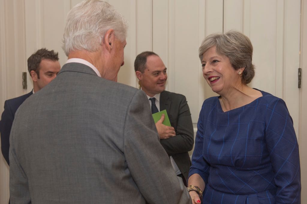 theresa_may's tweet photo. Cup of coffee with @BillClinton in Downing Street this morning where we discussed the situation in Northern Ireland. https://t.co/nfQXvZi9zO