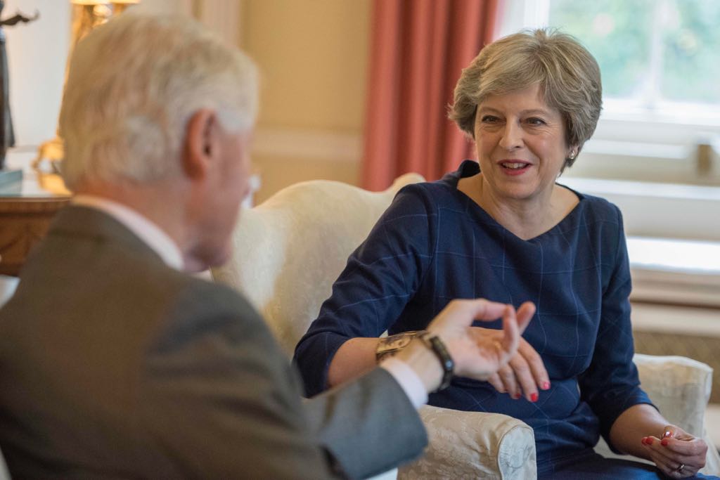 theresa_may's tweet photo. Cup of coffee with @BillClinton in Downing Street this morning where we discussed the situation in Northern Ireland. https://t.co/nfQXvZi9zO