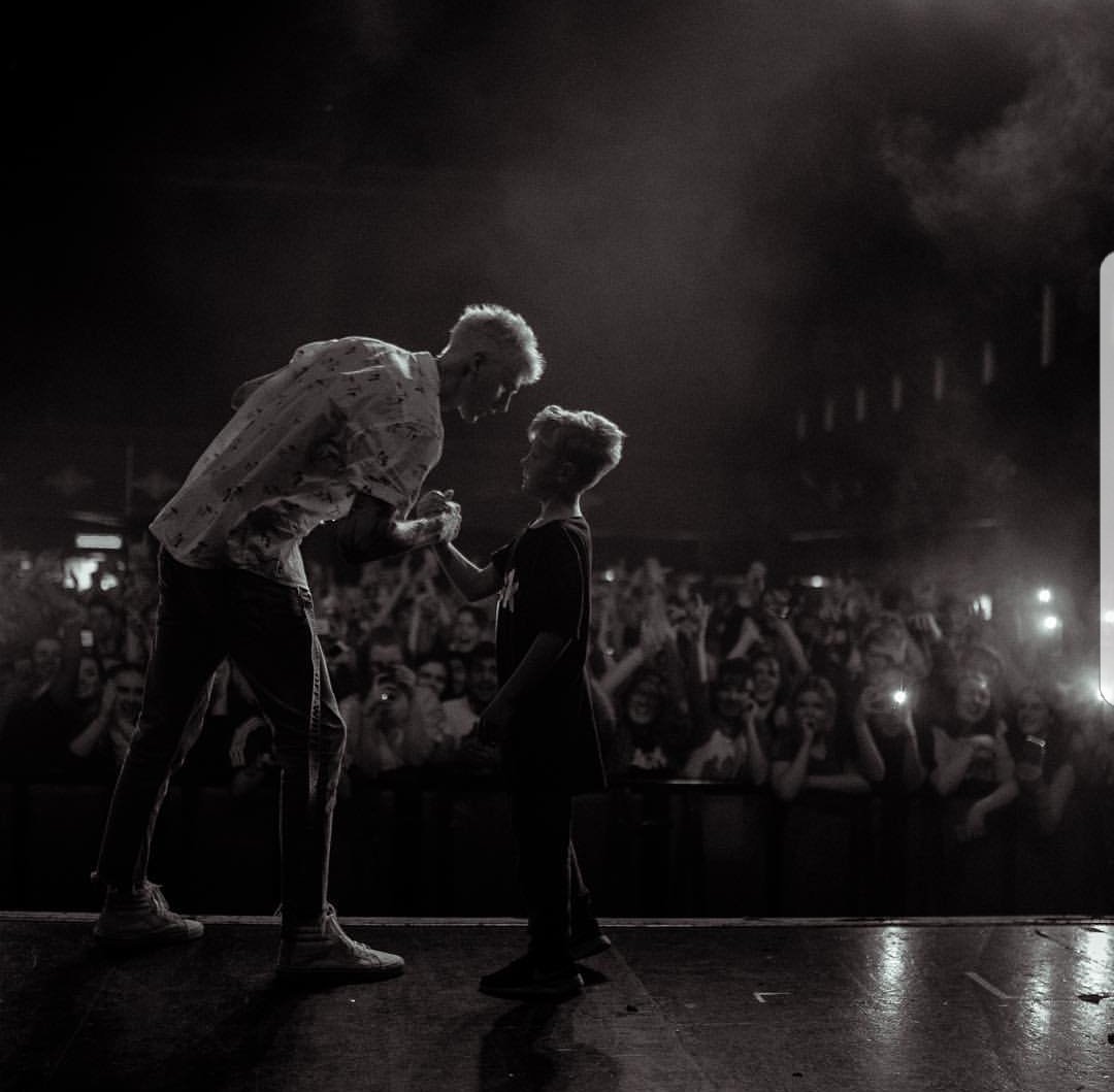SharonBradburn's tweet photo. My Son #Dylan on stage 🥀❤🤘 @machinegunkelly @J_WOZY Getting this photo in a canvas #firstgig #faverapper #memories https://t.co/ItgsQjoxDF https://t.co/Avsaw1IIpK