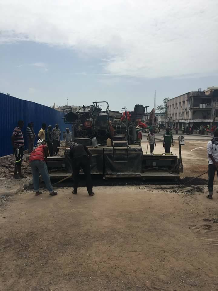 AbdulBillowAli's tweet photo. "Down but not out", engineers repair a section of the road destroyed in Saturday's deadly truck bomb in KM5 #Mogadishu. #Resilience #Somalia https://t.co/OVbxQBEoO5