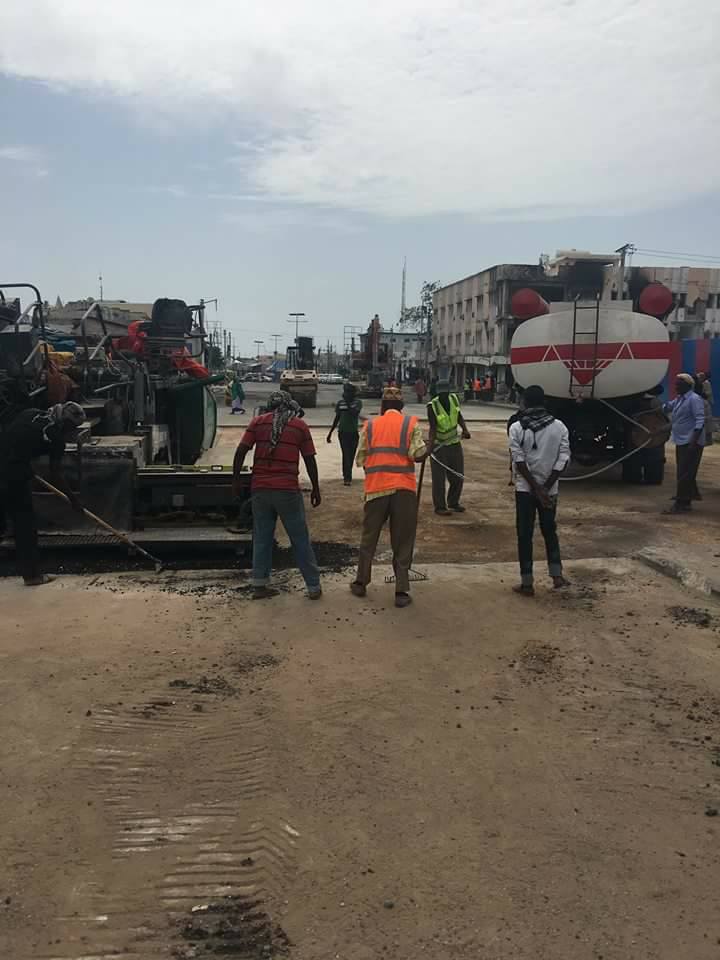 AbdulBillowAli's tweet photo. "Down but not out", engineers repair a section of the road destroyed in Saturday's deadly truck bomb in KM5 #Mogadishu. #Resilience #Somalia https://t.co/OVbxQBEoO5