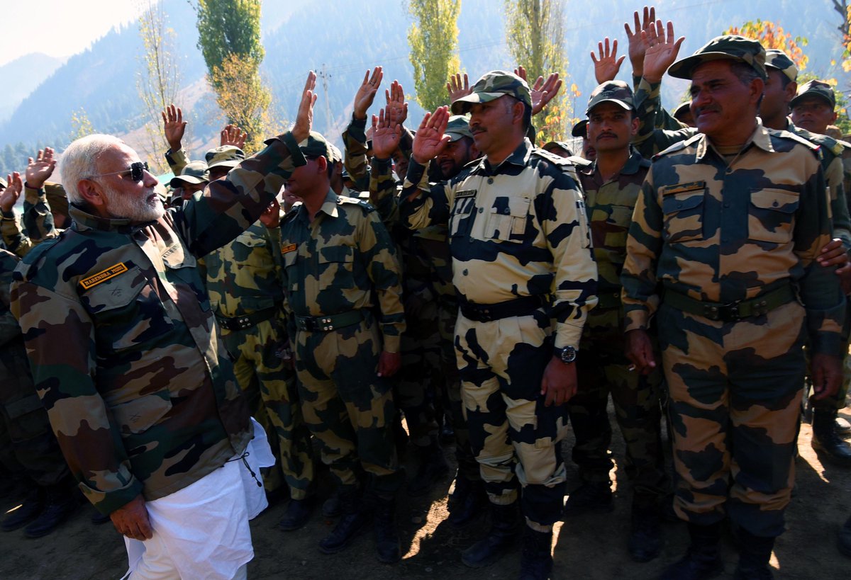 PMOIndia's tweet photo. PM @narendramodi celebrated Diwali with the jawans of Indian Army and BSF in the Gurez Valley, Jammu and Kashmir. This is the fourth successive Diwali that the Prime Minister has celebrated with jawans on the border. https://t.co/lXBcemJgWE