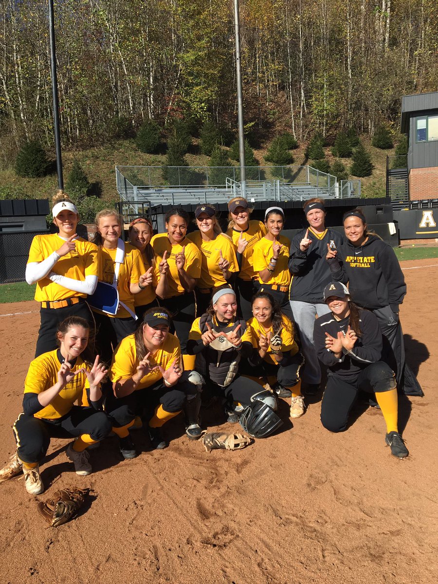 black and gold softball uniforms