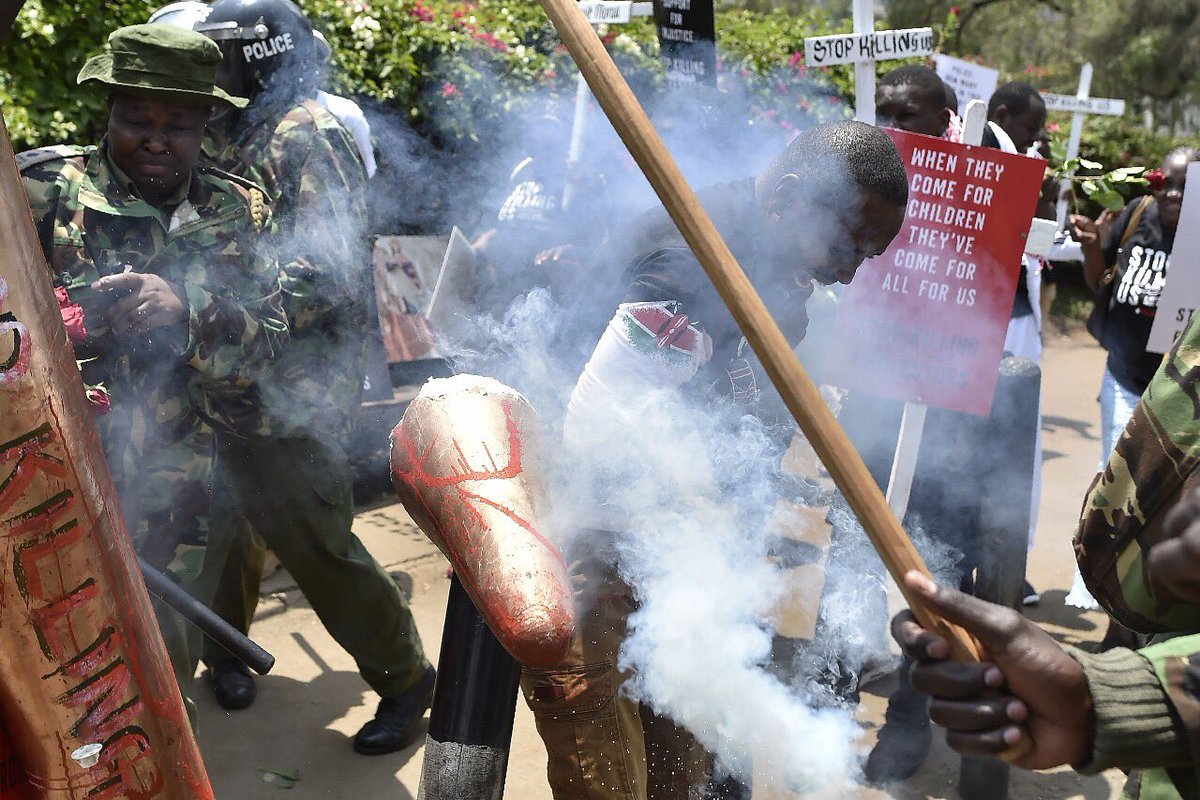 bonifacemwangi's tweet photo. I was a carrying a giant,dummy bullet written #StopKillingUs. The police officer pushed me and then fired to my chest, point blank! https://t.co/DarEAyJ19s