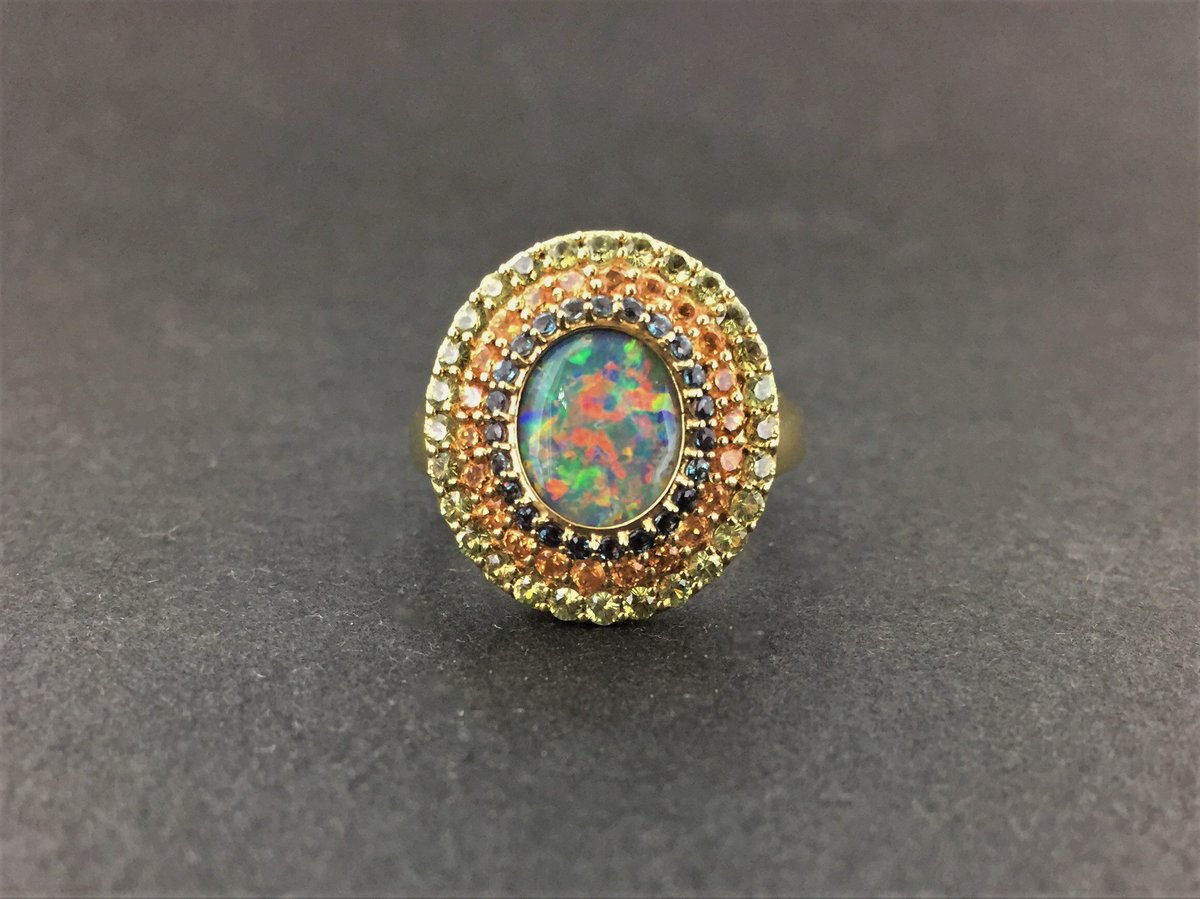 llynstrong's tweet photo. New #18k yellow #gold triple-halo #opal #ring with #spessertitegarnet, #dematoidgarnet and #alexandrites here to prove #color is nothing to be afraid of! #llynstrong #jewelry https://t.co/2Or8253exc
