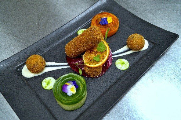 compassgroupuk's tweet photo. ... And in third place in our #WomenInFood @QuornFoods competition is @DjukanOFF for his Quorn, Orange and Kidney Bean Croquettes - wow! 😀 https://t.co/UoyWrs5F0G