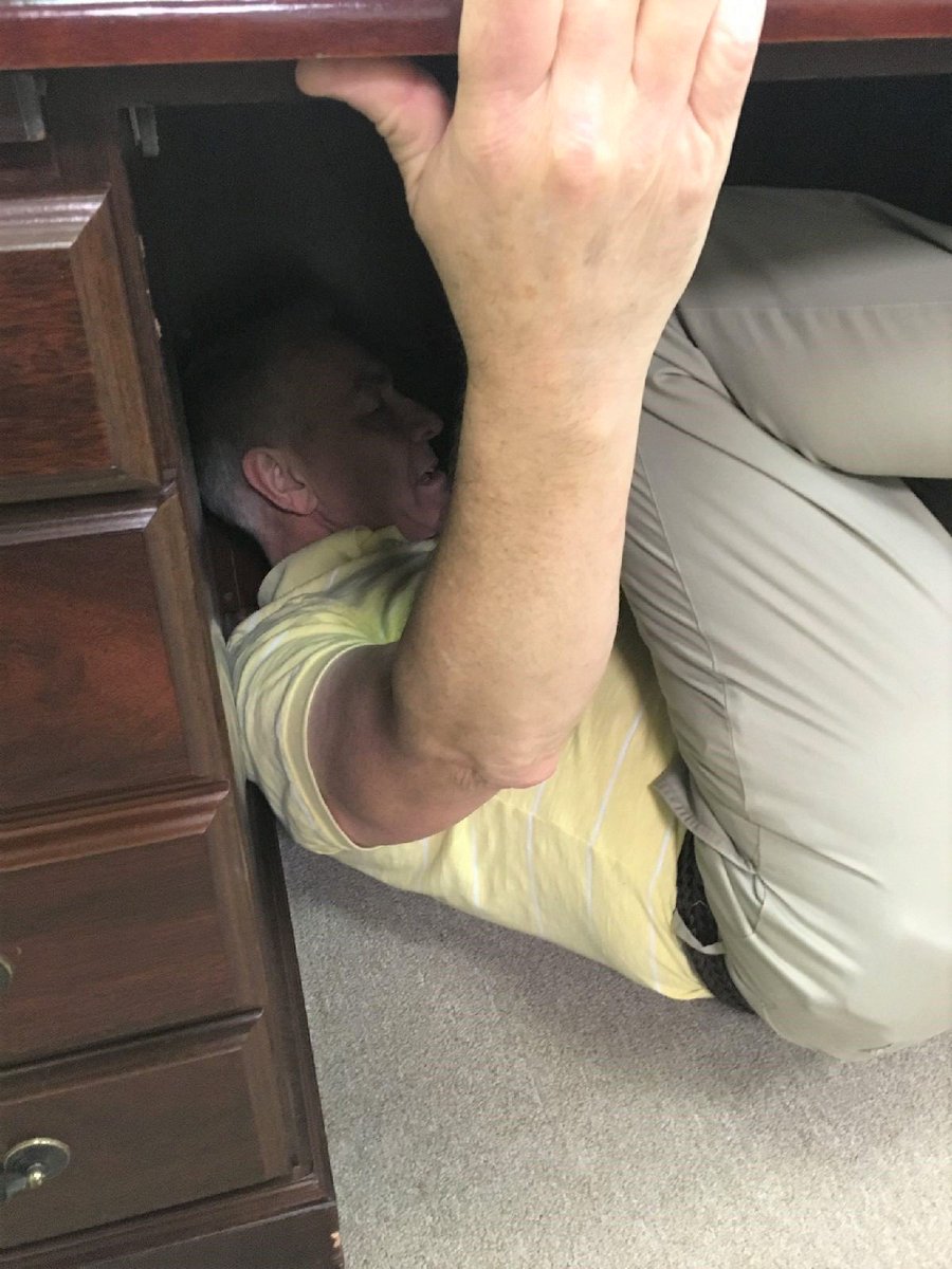 CSC_Tulsa's tweet photo. CSC employees practicing "Drop. Cover. Hold on." during the #ShakeOut .@NewsOn6 #CSCTulsa #ItsWhatWeDo https://t.co/OhDhBiTzpG
