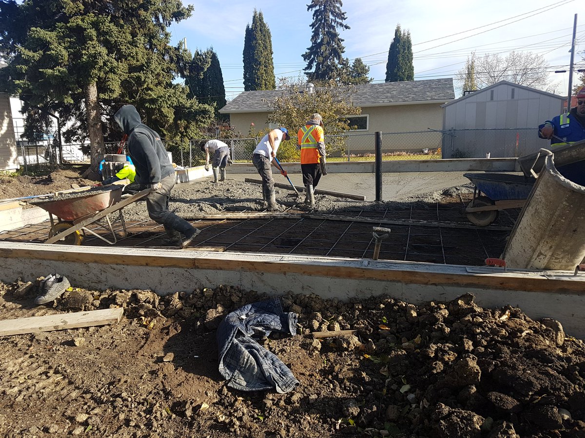 When I schedule concrete this late in the year, I can almost always count on a blizzard. Not today, it's a beautiful day for a pour!