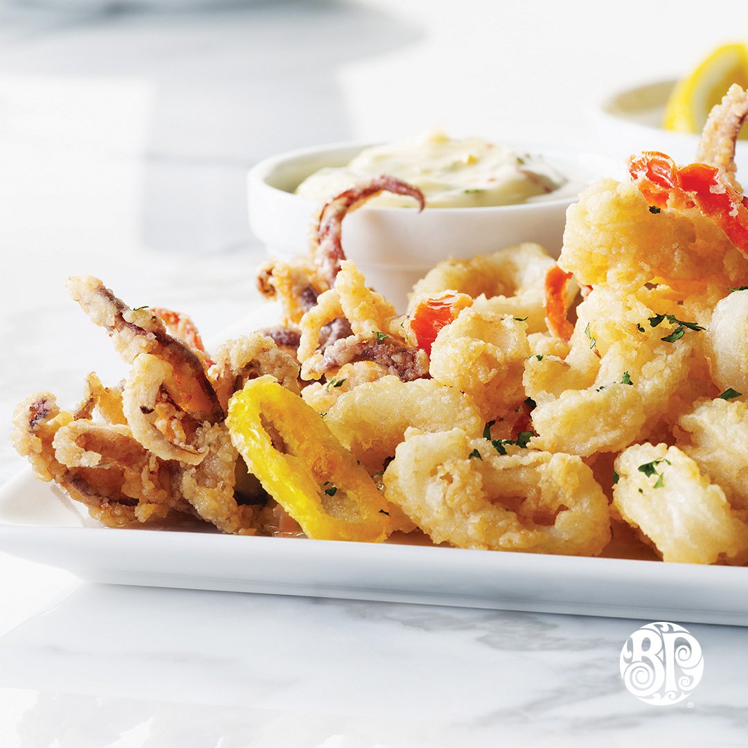 Our calamari is served with banana peppers lightly dusted &amp; fried to perfection... for those who like the heat! #BostonPizza #StratfordON