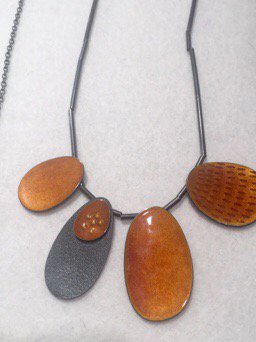 Gorgeous deep colours of autumnal glazes by <a href="/caroline_finlay/">Caroline Finlay</a> #madelondon @TuttonandYoung