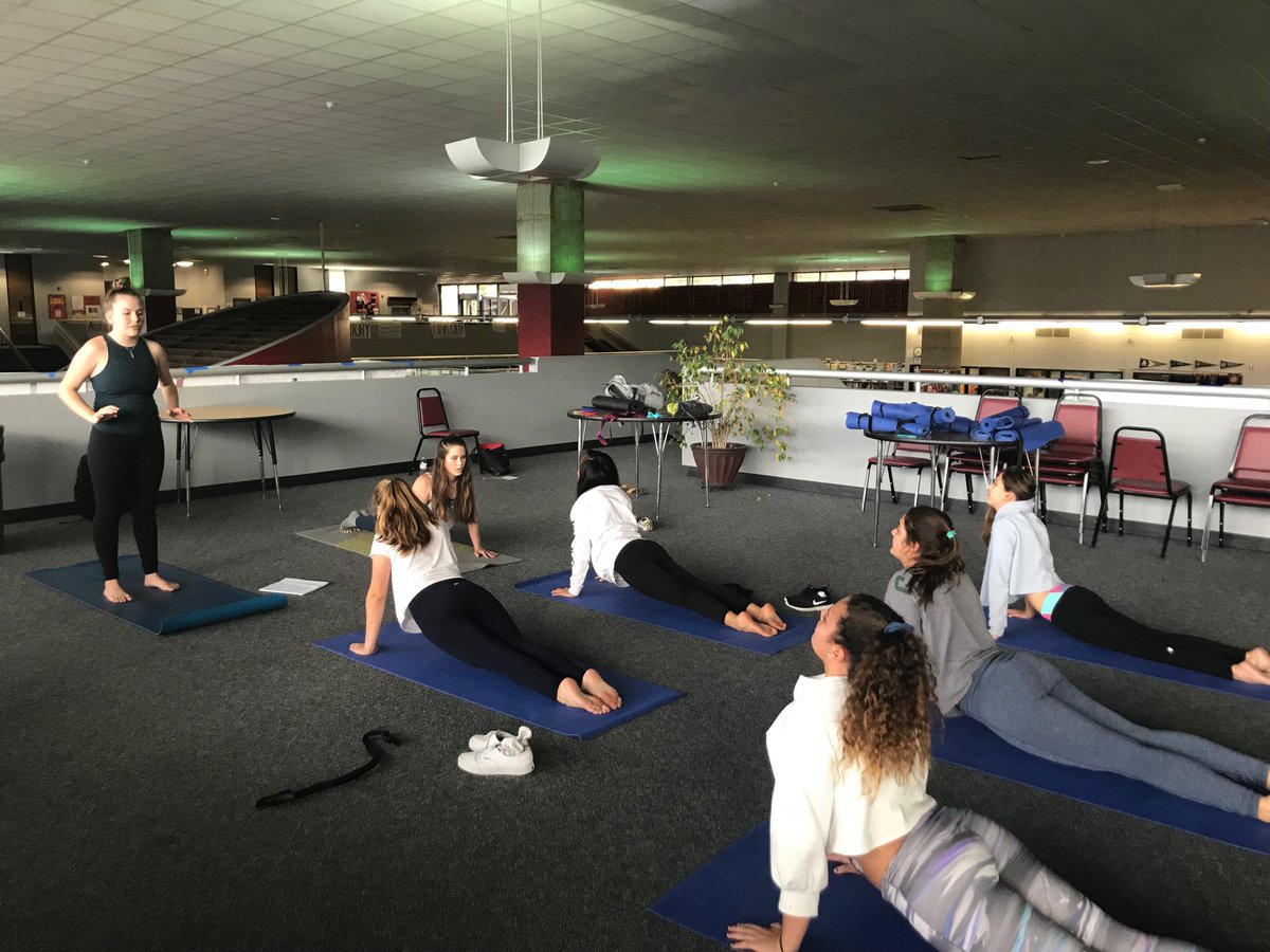 AmberLineweaver's tweet photo. Liv leads the Northgate Yoga Club in a vinyasa flow.  Namaste 🙏 https://t.co/4wN4tdMCAW
