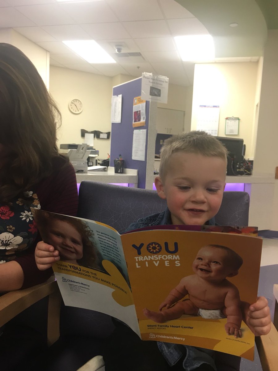 ChadWahlgren's tweet photo. Winston found some interesting reading material while waiting for his appt in the @ChildrensMercy cardiology lobby! #ThatsMe #GoFightWinston https://t.co/NyEgChFU2k