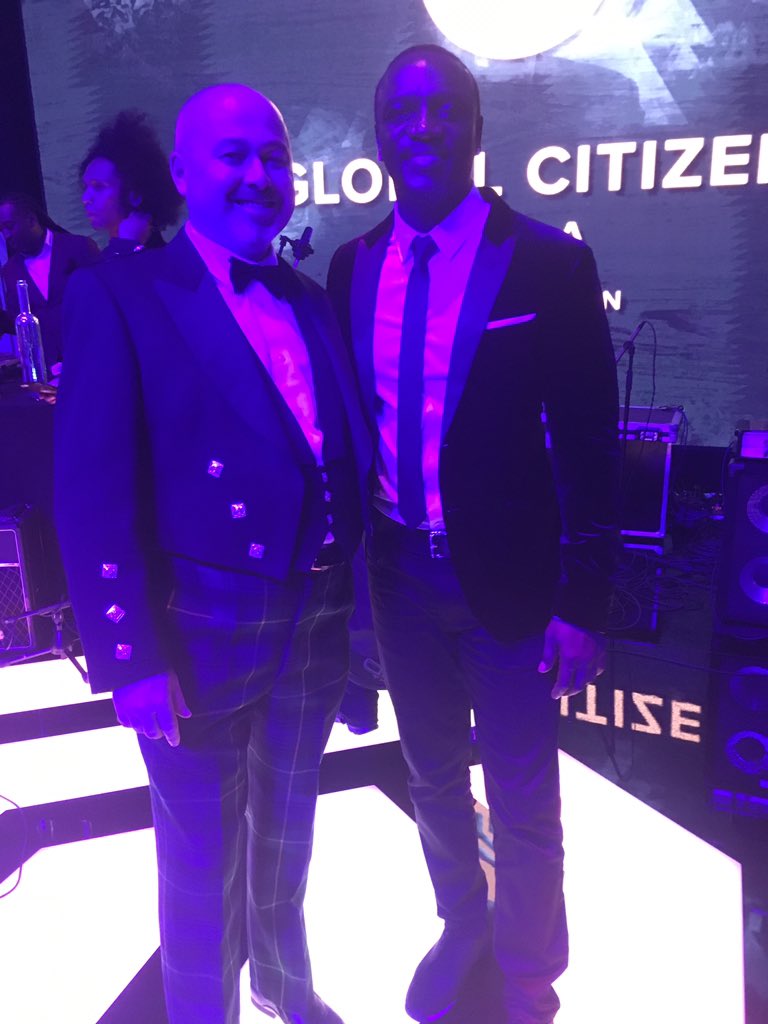 jcraigbarker's tweet photo. Minding my own business and up pops Akon asking for a photo. I think he liked my outfit!! Amazing, highly intelligent and interesting guy. https://t.co/S6i5gtaLIl