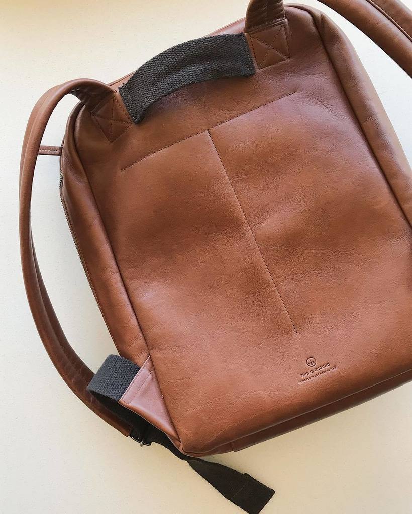Thisisground's tweet photo. Stitched T on the back of our backpacks #tigcasestudy #ThisIsGround https://t.co/W7YmkpqaTf https://t.co/qucVJw2ntT