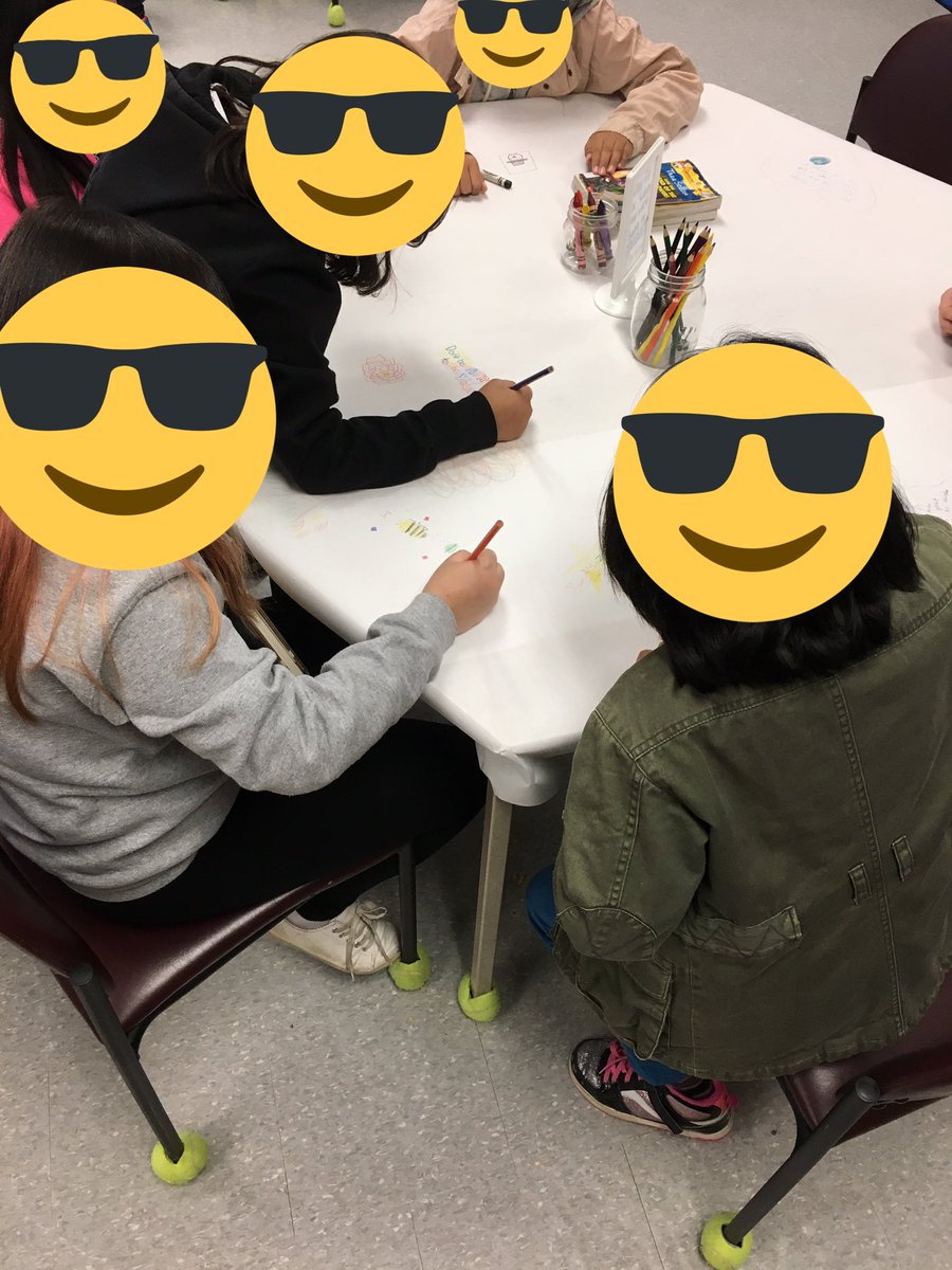 Students using the graffiti table to write each other motivational words!