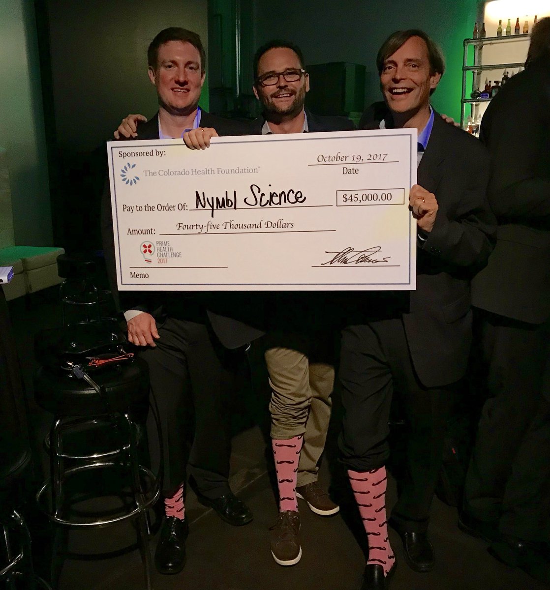 Boomtownhealth's tweet photo. Well done @getnymbl! They won the grand prize of $45k at the @PrimeHealthCO pitch competition! #HealthTech and those socks! https://t.co/J1zZY7ac6y