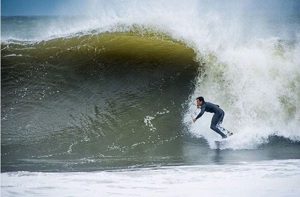 Cate Brown (IG: catebrownphoto) with the sick shot of team rider Sam Lev getting his fix at this hurricane swell. #SupportLocalPhotographers