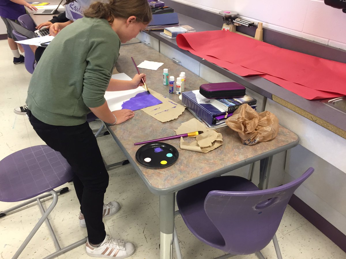 Mr. Cole's 7th graders making artistic, informative posters about the Periodic Table.