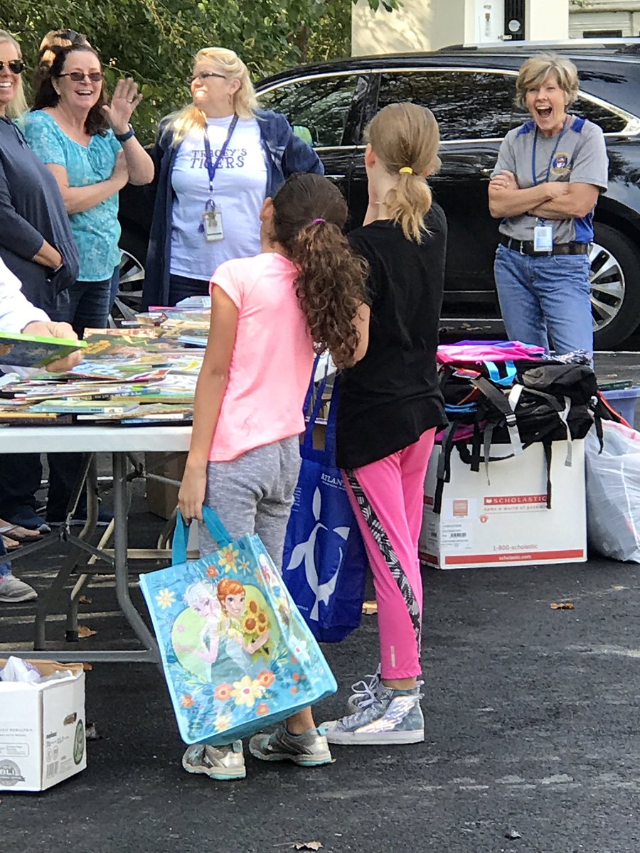 Sharing the love of reading in the community <a href="/TraceysAACPS/">Tracey's Elementary</a> <a href="/UnlockingAACPS/">EngageEmpowerEducate</a>