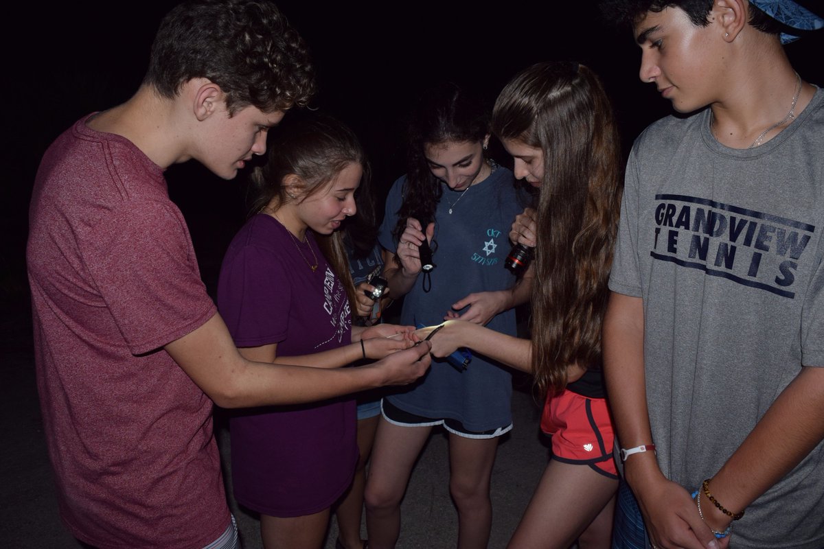 evolutionclass's tweet photo. Students observing a South Florida swamp snake (Seminatrix pygaea cyclas) on last night's survey in the northern Everglades. #gpslearns https://t.co/dJiVjouep8