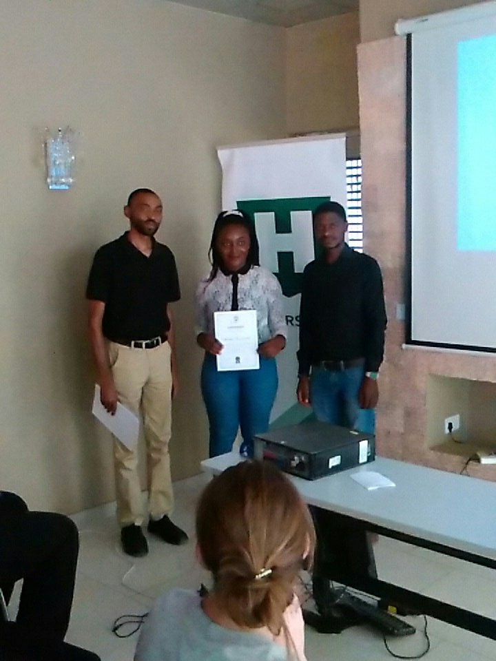 thehackersguild's tweet photo. Presentation of certificates of completion to the #hackersguild #BootCamp students. Martha Kumwenda smiling at her achievement. https://t.co/lseXgt4Kss