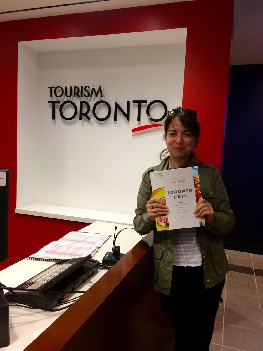 Just doing my part for this great city: biked over to <a href="/SeeTorontoNow/">Destination Toronto</a> to sign a couple dozen copies of #TorontoEats. 👍
