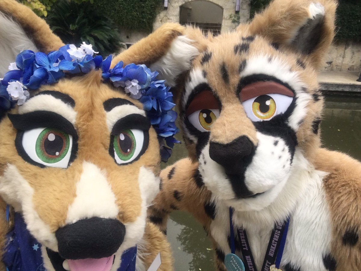 EscoDingo's tweet photo. Happy #FursuitFriday! @BlkSwampCheetah and I on the riverwalk during Alamo City Furry Invasion earlier this month! #ACFI #ACFI2017 https://t.co/O5iF3yQAs0