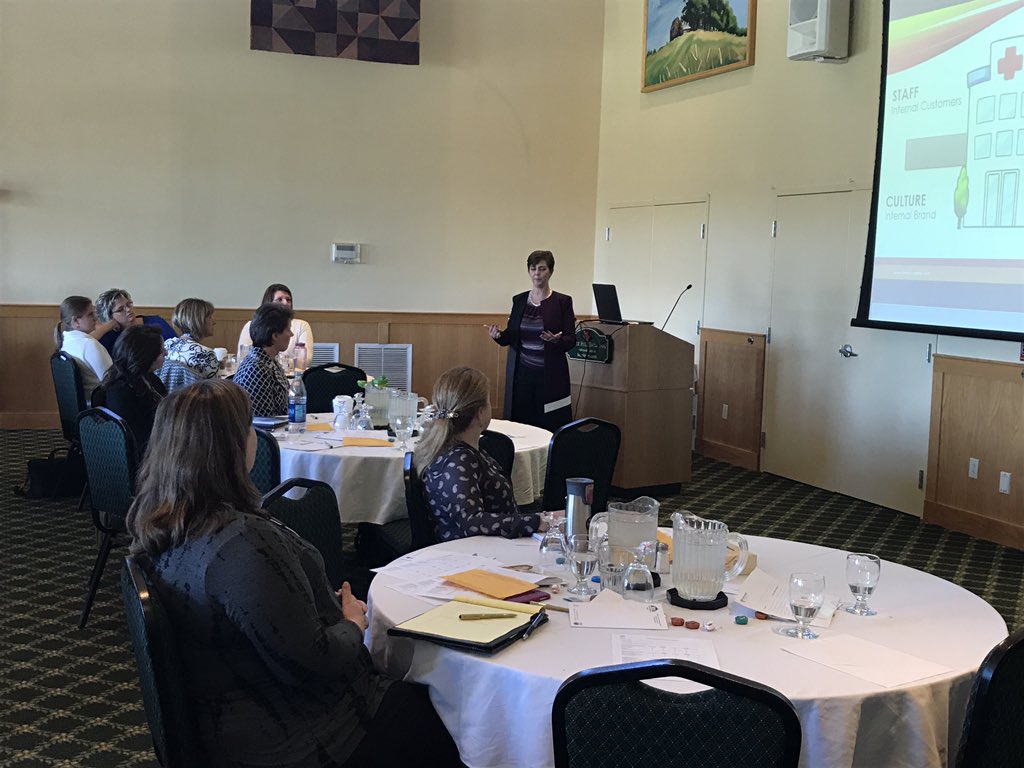 Charlene DeCesare presenting on successful communication in and out at the Women in Leadership event #charleneignites; #HFMAhere