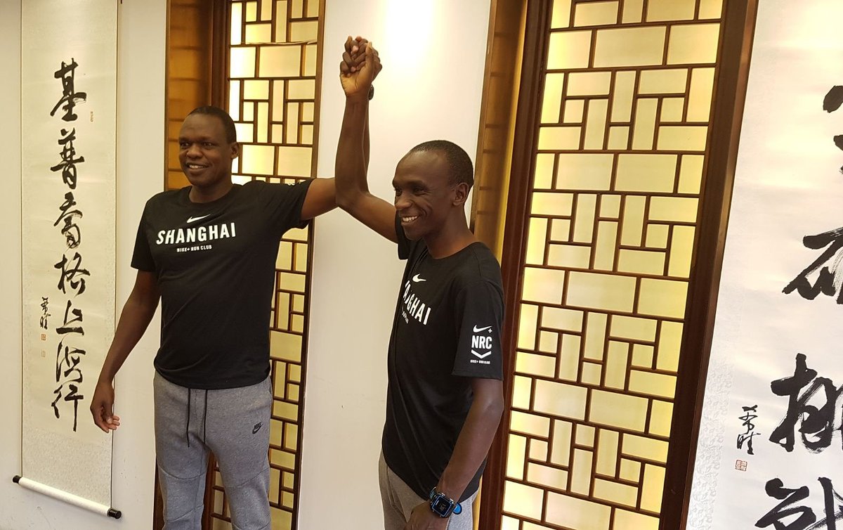 EliudKipchoge's tweet photo. Together with my career-long coach Patrick Sang in Shanghai #nike #nikerunning #nnrunningteam https://t.co/oOprJZQBzK