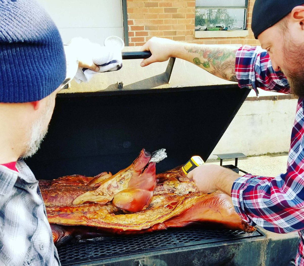pcg_charlotte's tweet photo. #Carved2017 is just hrs away! Chefs @MarcJacksina & Ben Philpott getting our #TwoPigsFarm hog ready! CU 3pm at @LennyBoyBrew Tkts @ the door https://t.co/9TsX7klquK