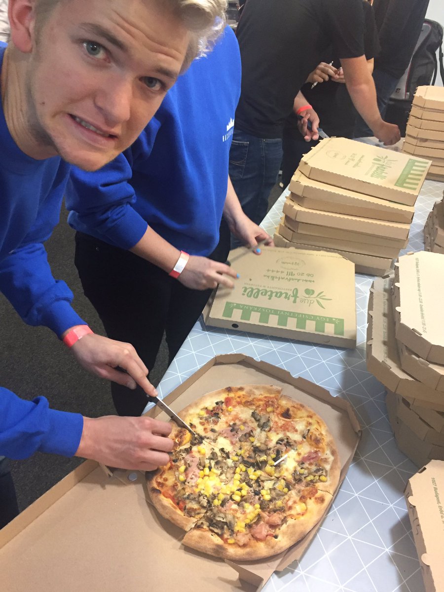 MLHacks's tweet image. Just a few more slices till #HackBudapest 🍕 are ready 😋 👌