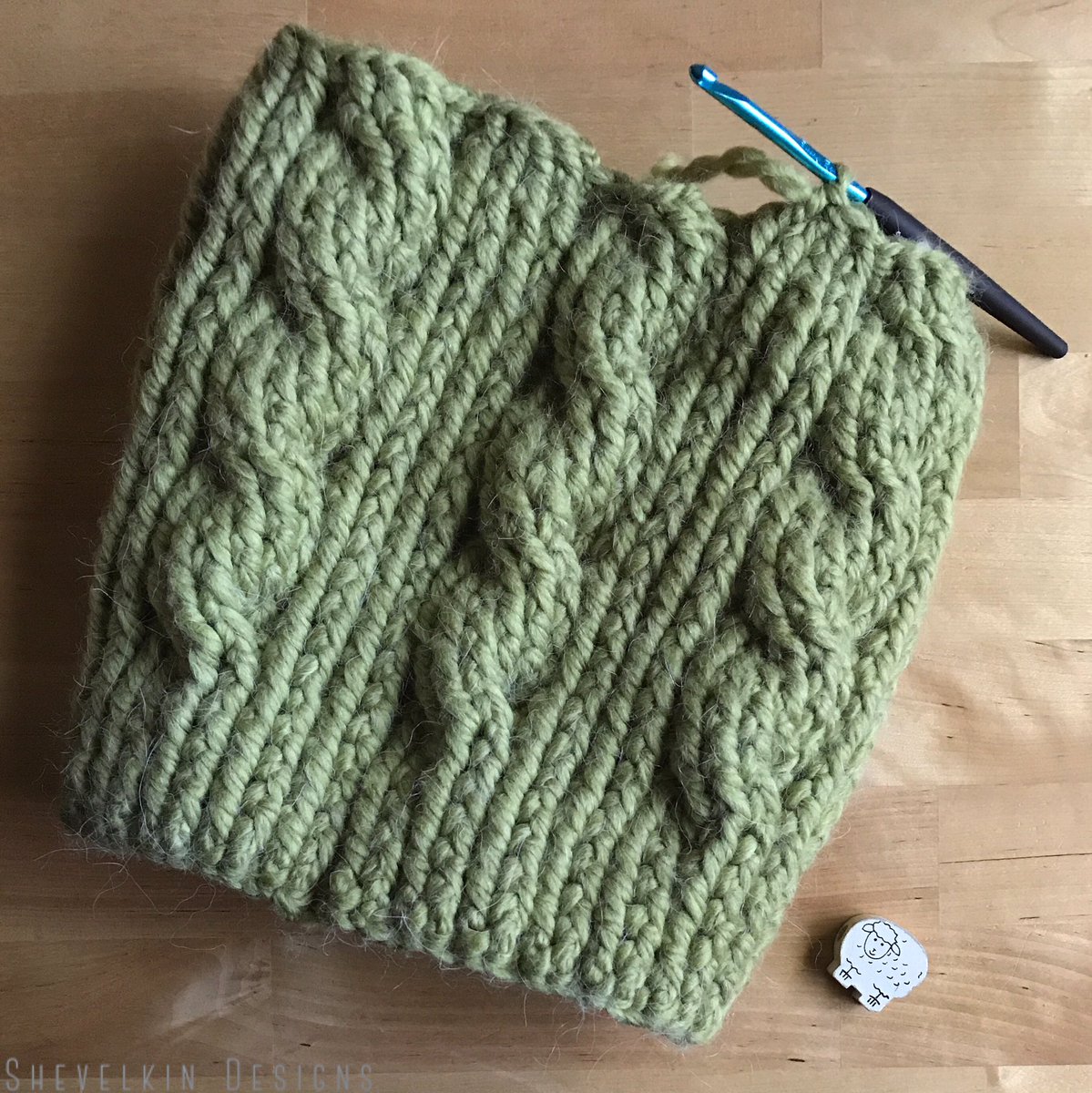 ShevelkinDesign's tweet photo. Wool #cablehat is my new love ❤️ #wip now finished @Yarnspirations1 #HandmadeHour @HandmadeHour #crochet #crochethat https://t.co/BAPBu3k0bf https://t.co/wGq8K87pva