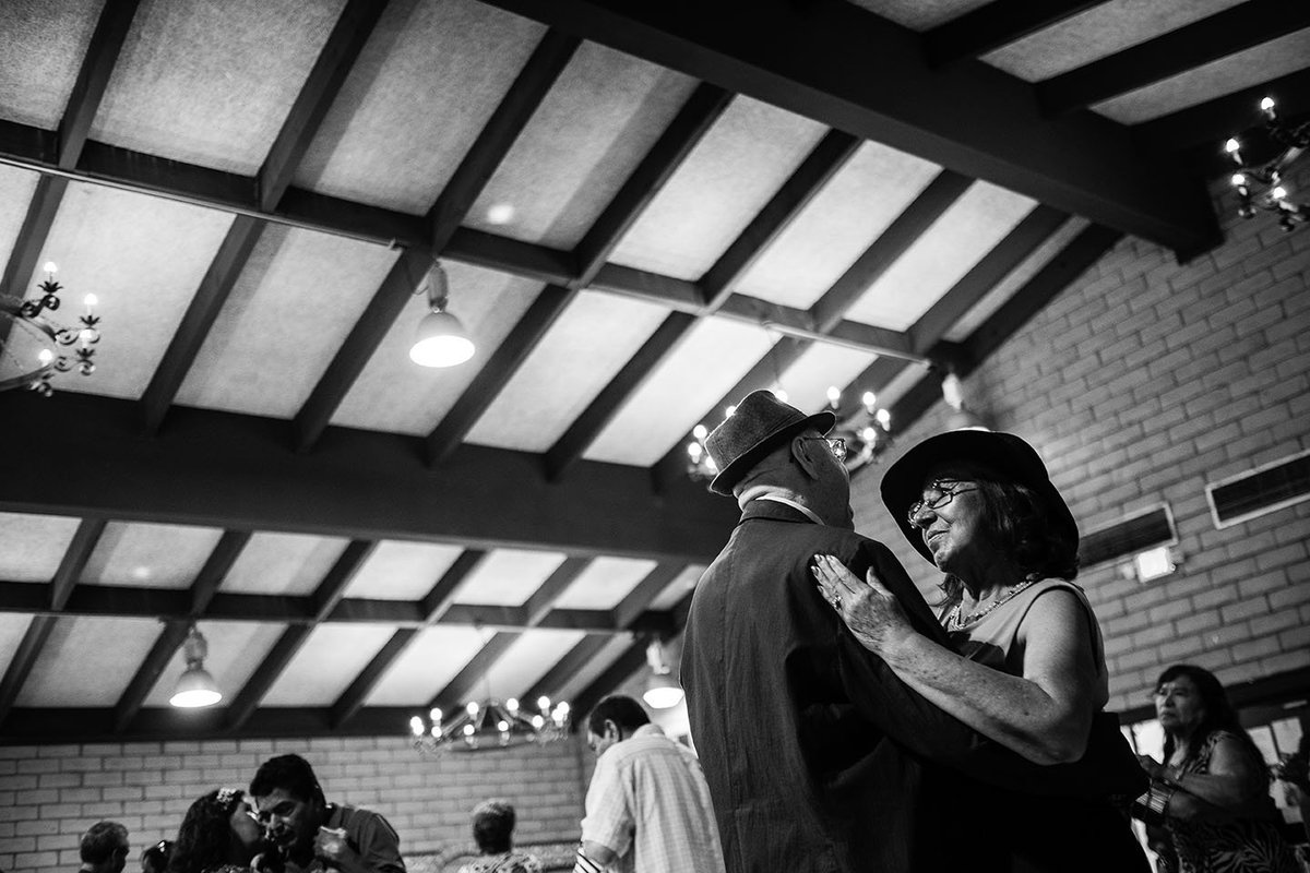 Two older people dancing
