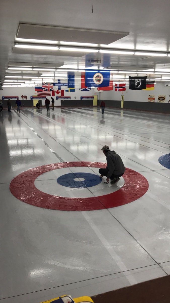 The lines and circles are going in, it’s starting to look like a #CurlingClub again.