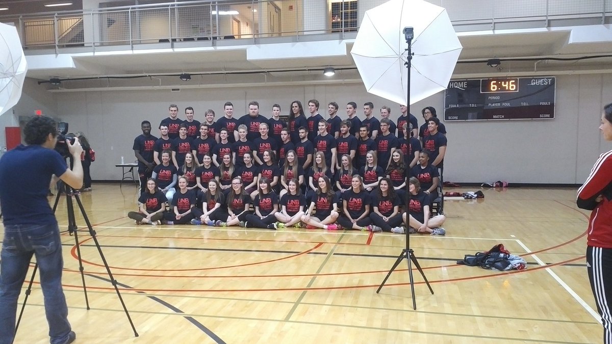 UNBXC's tweet photo. Team pic of the whole 2017-2018 @VarsityReds @UNBTrack team at the "Red and Black" Day! #IamVRed #run #jump #throw https://t.co/HJr8sug5zV