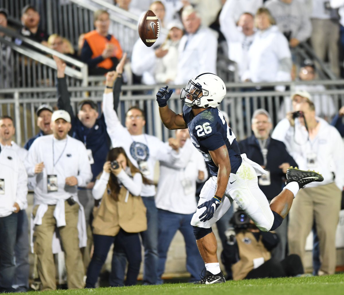 phoebe_sheehan's tweet photo. Penn State running back @saquonb21 fumbles the ball only for a moment before regaining control and scoring a touchdown #PSUvsMichigan https://t.co/jOj7BU2Dwp