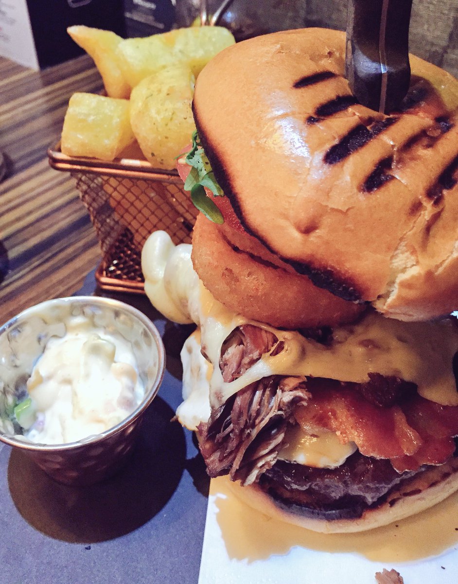 The Works burger <a href="/ThePloughInn_/">The Plough Inn</a> #feast ##brisket #onionring #bacon #friedegg #proteinfest #foodporn