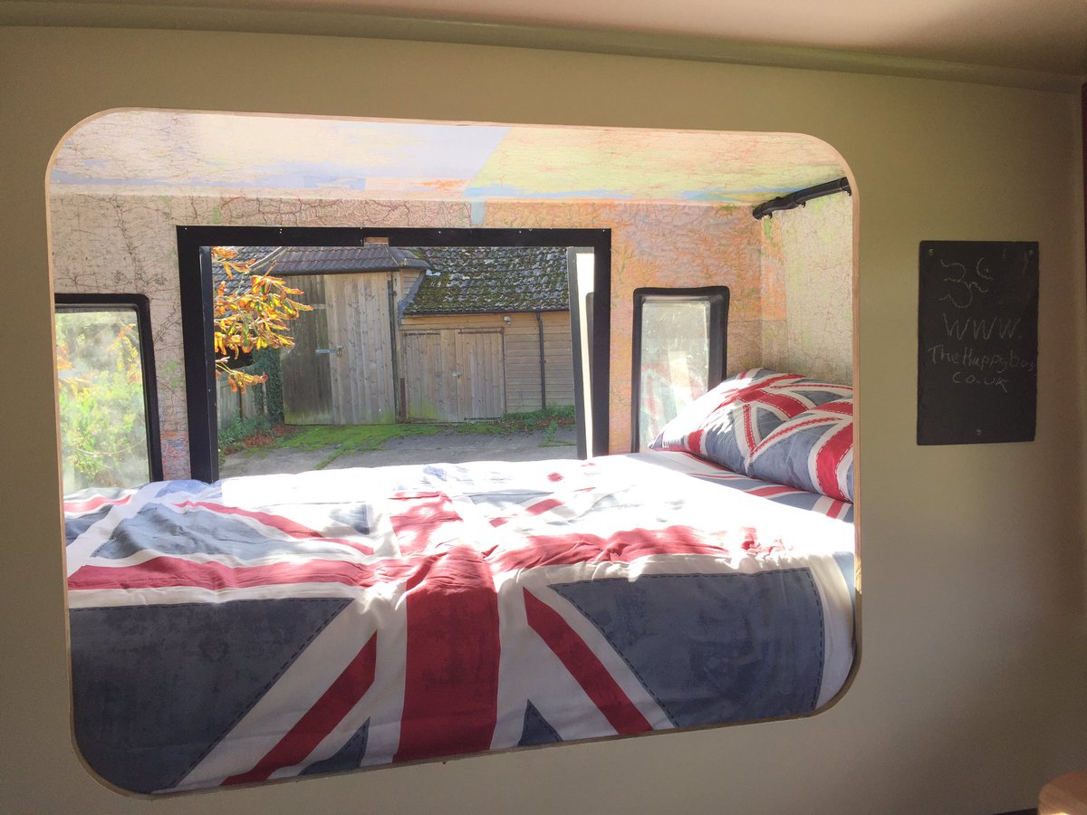 the_happy_bus_'s tweet photo. Our bed area is done!Maps galore and the obligatory foot #Vanlife shot!Excited! #RVLife #vanbuild #tinyhouse #rvbuild #thehappybus https://t.co/5MATGZb3sZ
