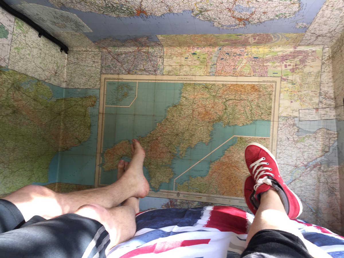the_happy_bus_'s tweet photo. Our bed area is done!Maps galore and the obligatory foot #Vanlife shot!Excited! #RVLife #vanbuild #tinyhouse #rvbuild #thehappybus https://t.co/5MATGZb3sZ