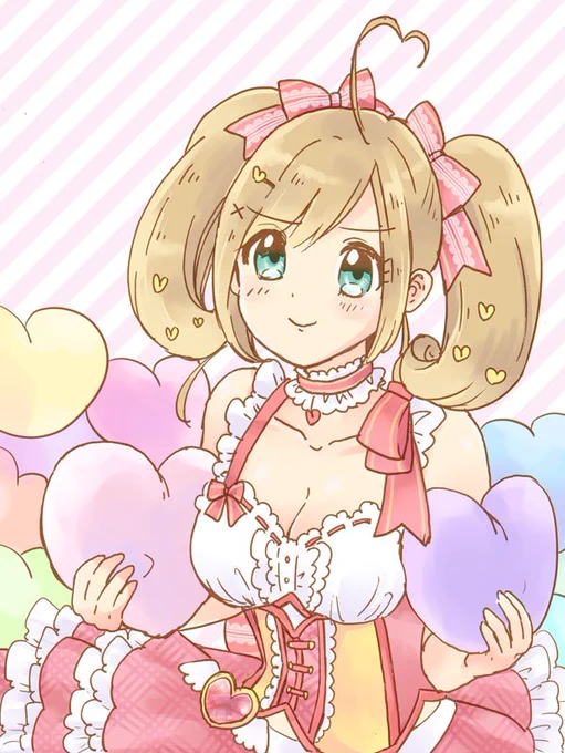 はーとクッションを持つ佐藤心さん 