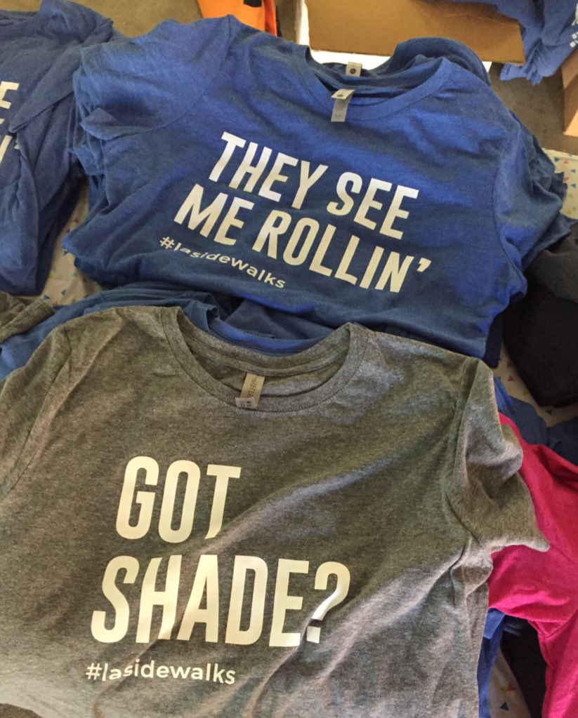 awalkerinLA's tweet photo. “They see me rollin’...” @InvestinPlace always has the best sidewalk advocacy shirts (and models, of course) #TrippingPoint #LAsidewalks https://t.co/Nazc2mJXOL