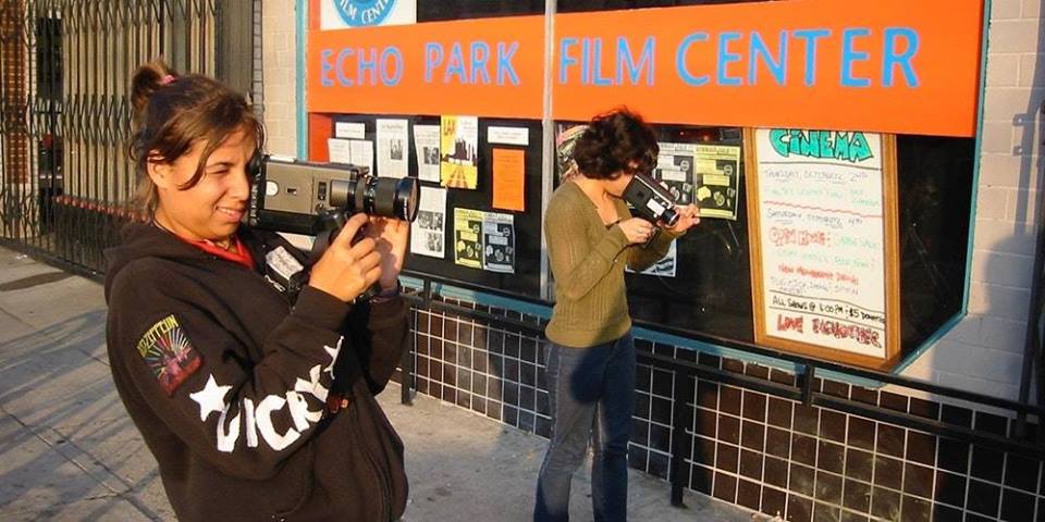 Two people recording videos