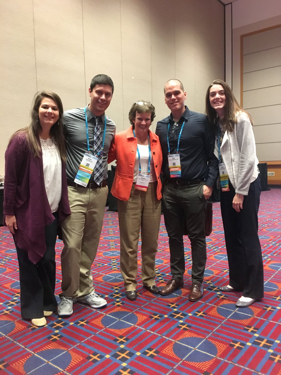 3rd year student Hannah Walton and 2nd year students Brian Dube, Matt Montgomery, and Lynne Hibbard with APTA president, Sharon Dunn at NSC