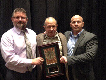 FHSKnightsAD's tweet photo. Mark, Jim, and John Krause: Recipients of "2018 Family Circle Award" from MO Chapter of the National Wrestling HOF. https://t.co/cfIE0wGpsu