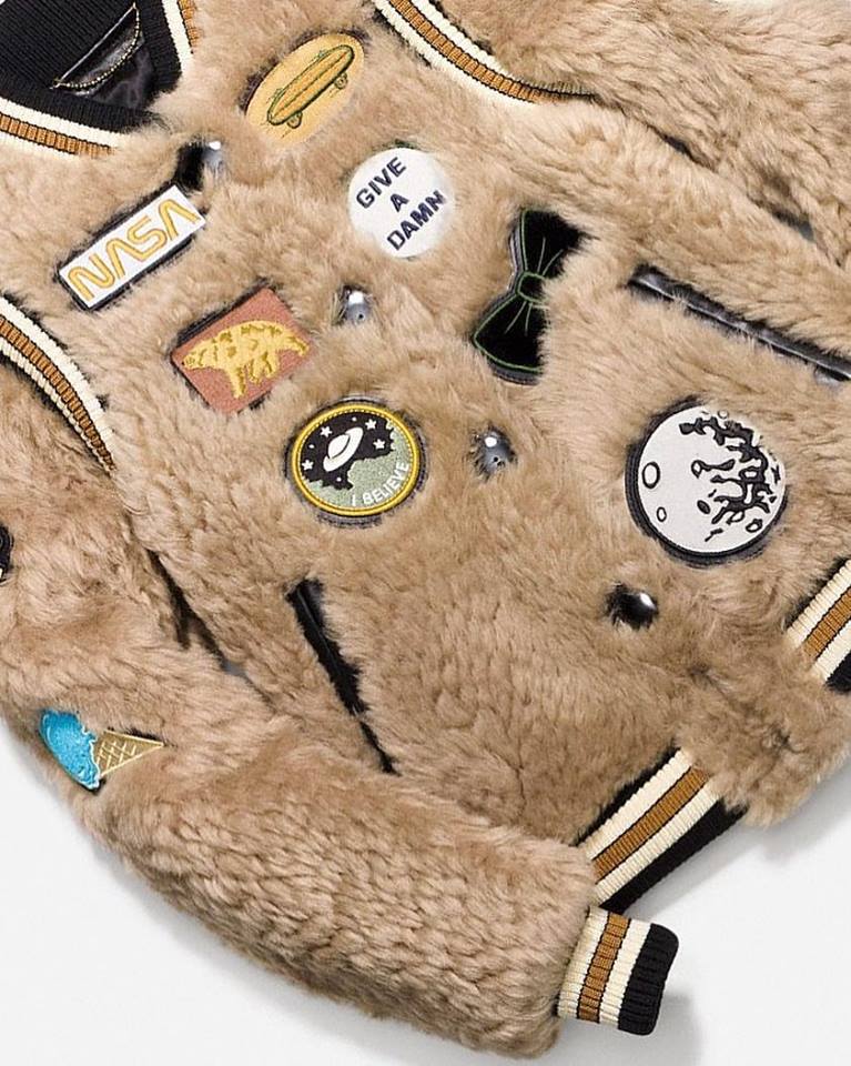 janegill_pr's tweet photo. This varsity jacket gives us all the warm &amp; fuzzy feels. #CoachSpace #Coach1941 https://t.co/T9Rvx56WoX