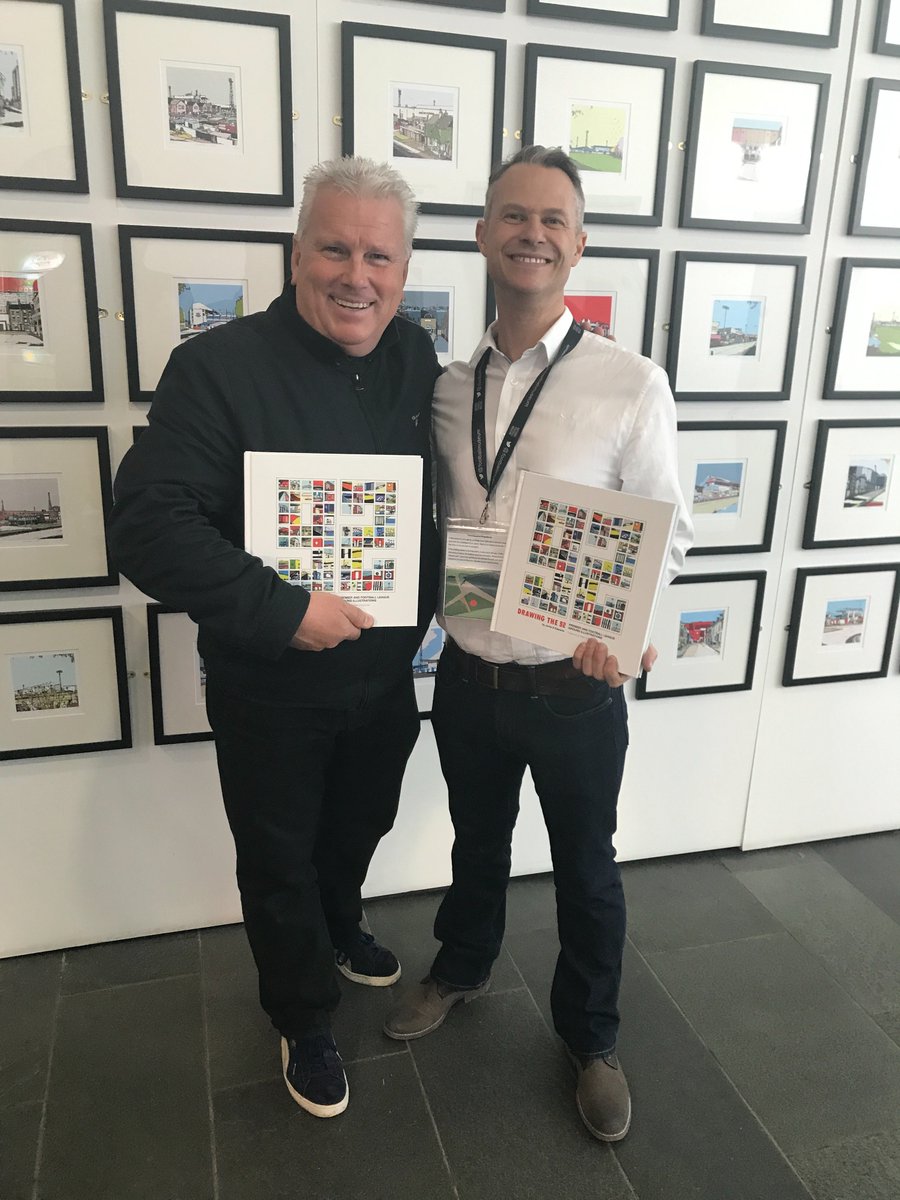 Artist Jamie Edwards drew in the celebrities at the launch of his new book, #Drawingthe92 He is pictured with #DavidWesthead from #W1A