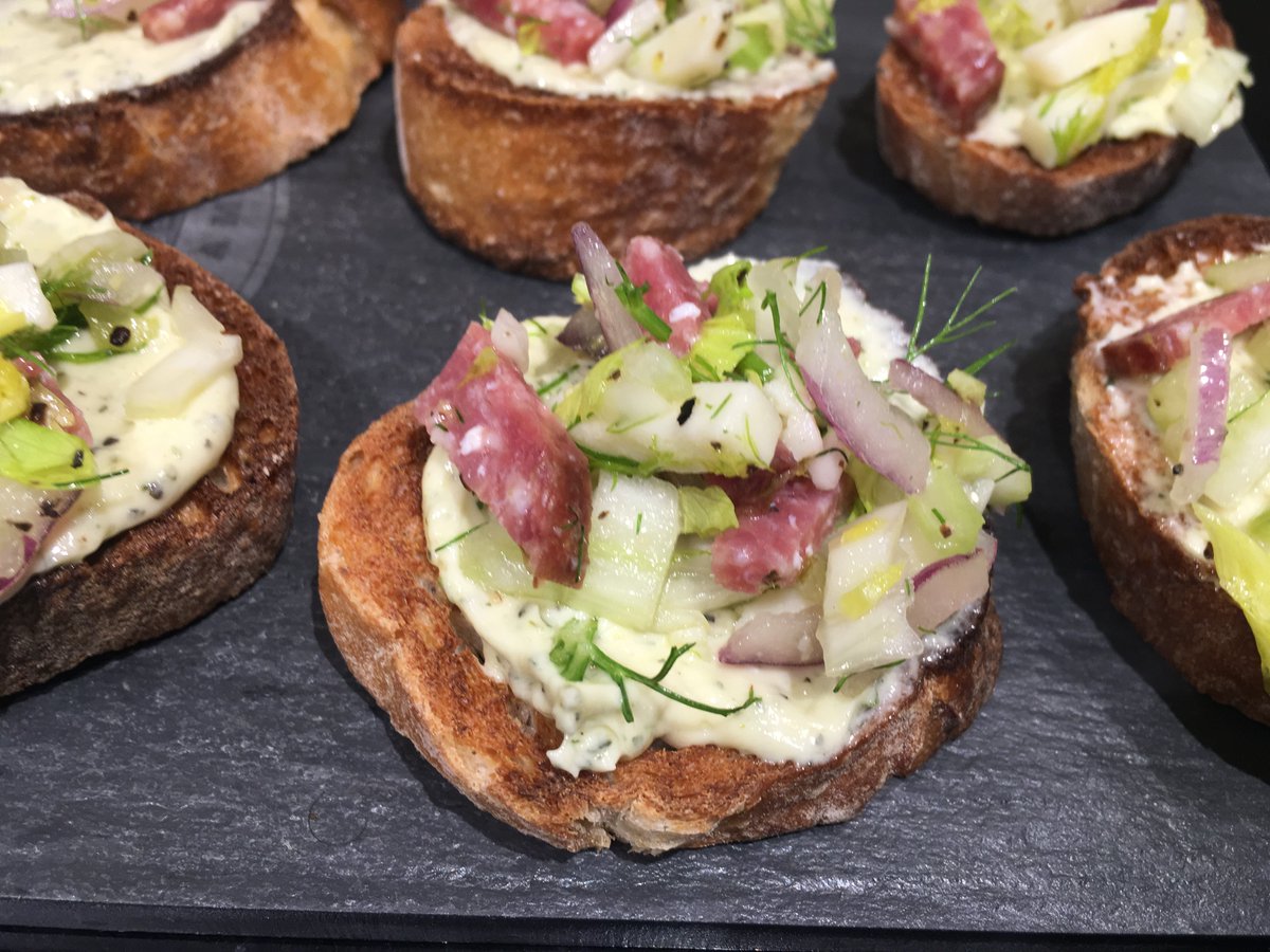 Perfect for #FallEntertaining Parmesan Garlic Butter crostini. Just spread on toast & top with your favorite pre-made Italian chopped salad.