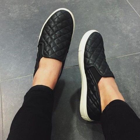 black quilted slip ons
